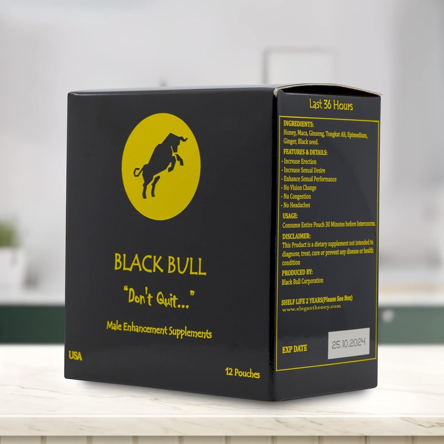 Black Bull male enhancement supplements packaging on a white surface with a blurred background